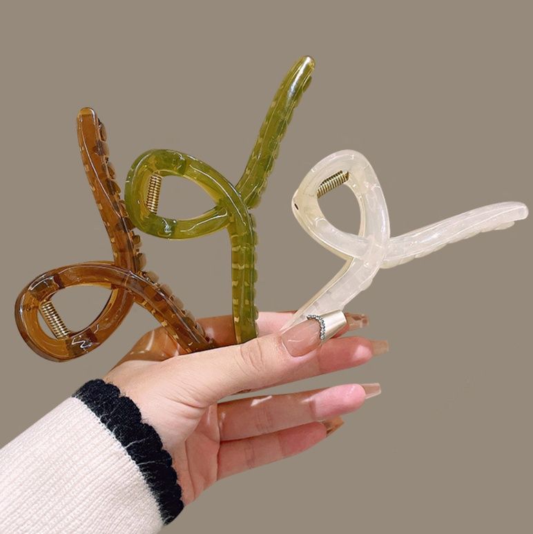 ヘアアクセサリー 透明感のある丸型金具付きスティックバレッタ