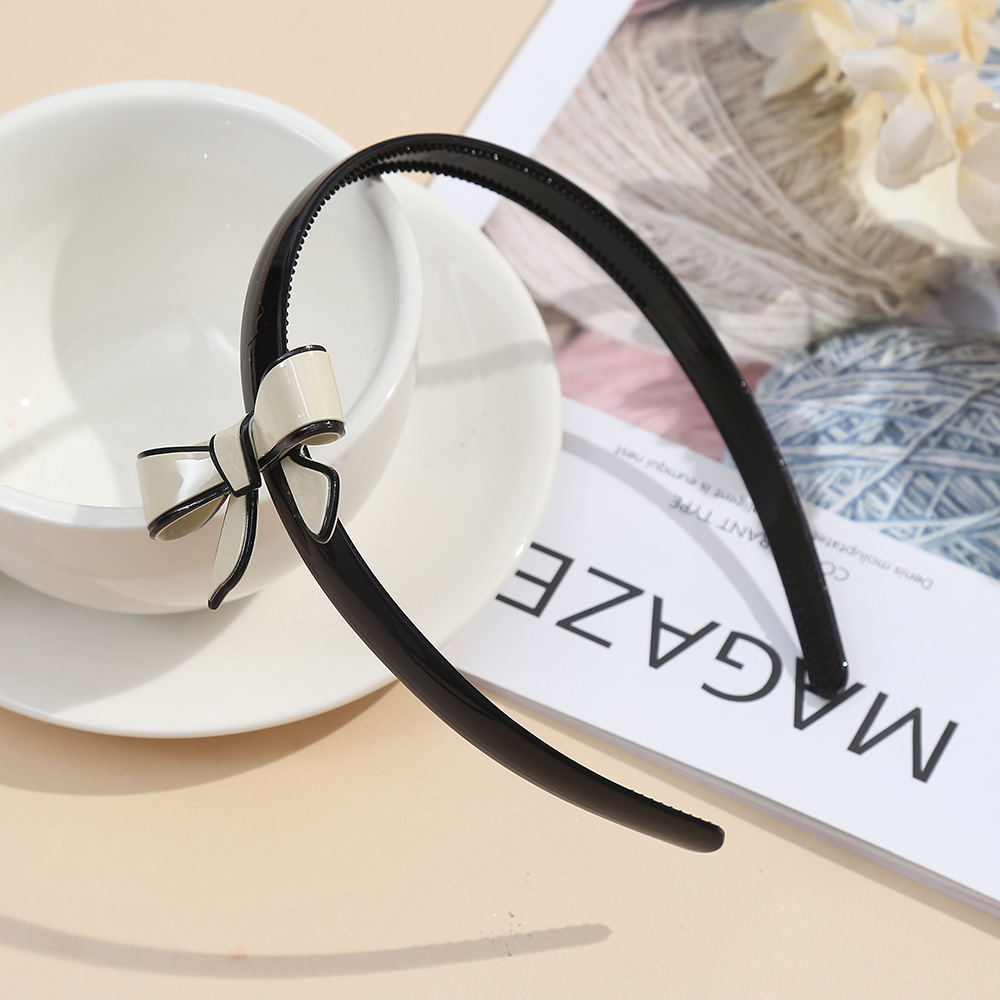 ヘアアクセサリー 艶やか配色リボンモチーフのカチューシャ