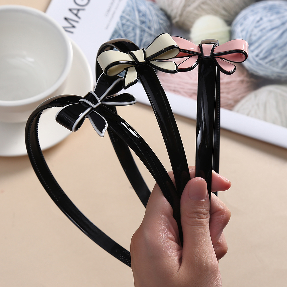 ヘアアクセサリー 艶やか配色リボンモチーフのカチューシャ