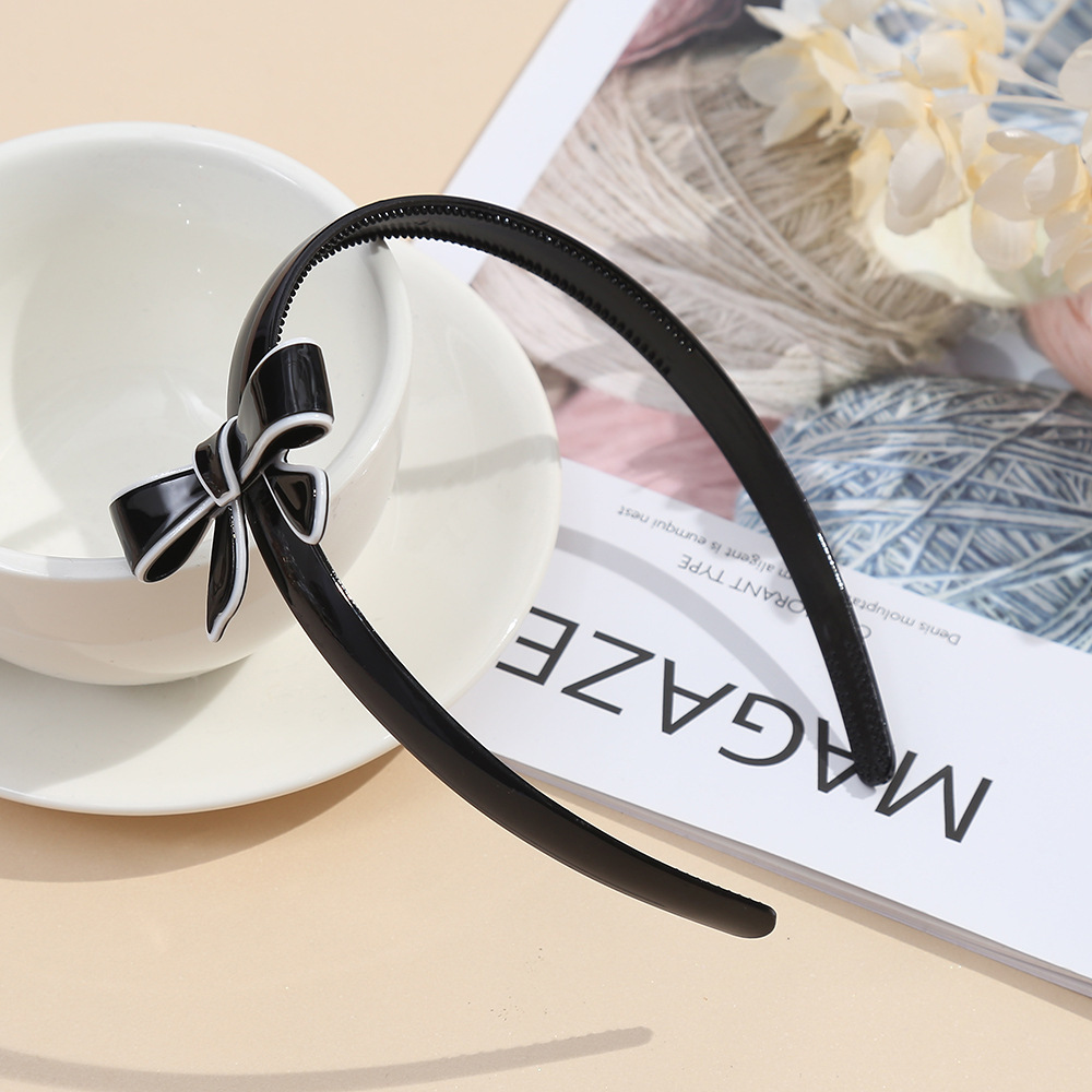 ヘアアクセサリー 艶やか配色リボンモチーフのカチューシャ