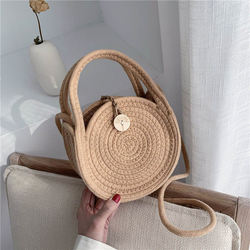 カゴバッグ 渦巻き編み丸型ボタン留めカゴバッグ