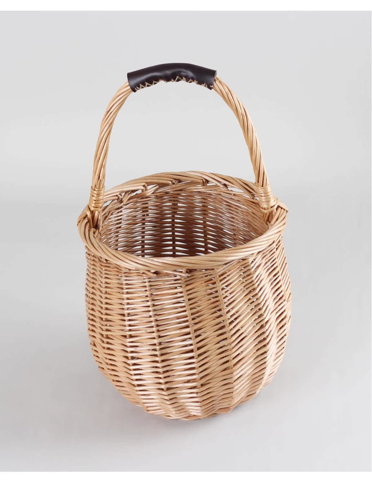 カゴバッグ 手編み籐素材の丸型ハンドバッグ