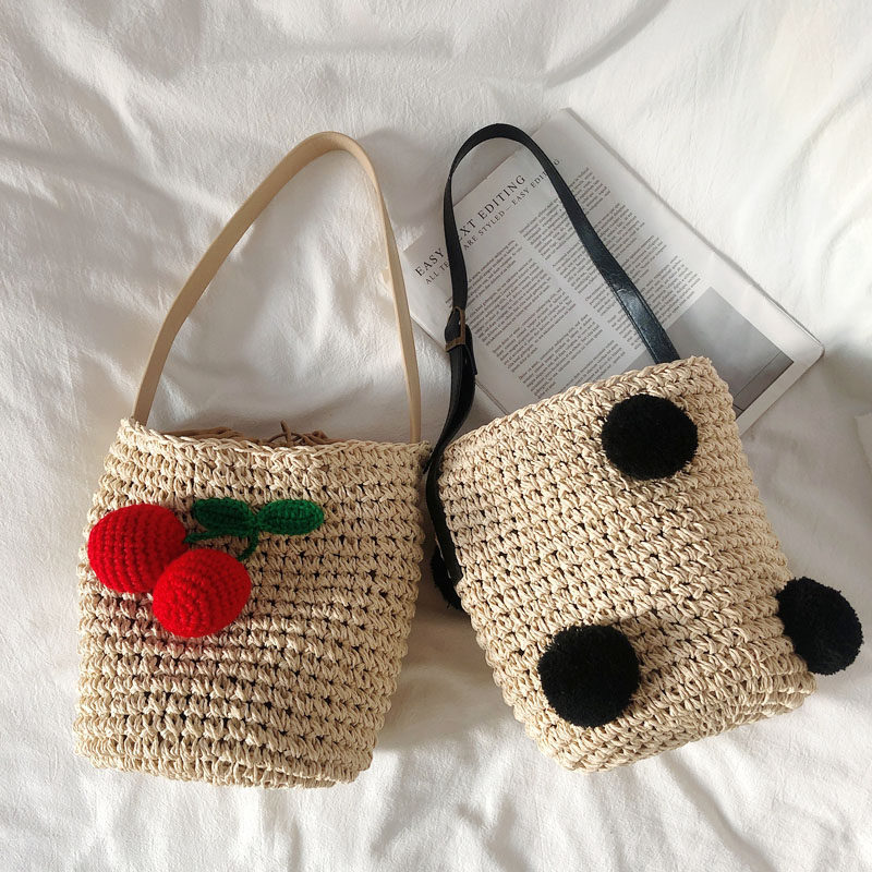 カゴバッグ 手編み立体ポンポン飾り付きハンドバッグ型かご編みバッグ