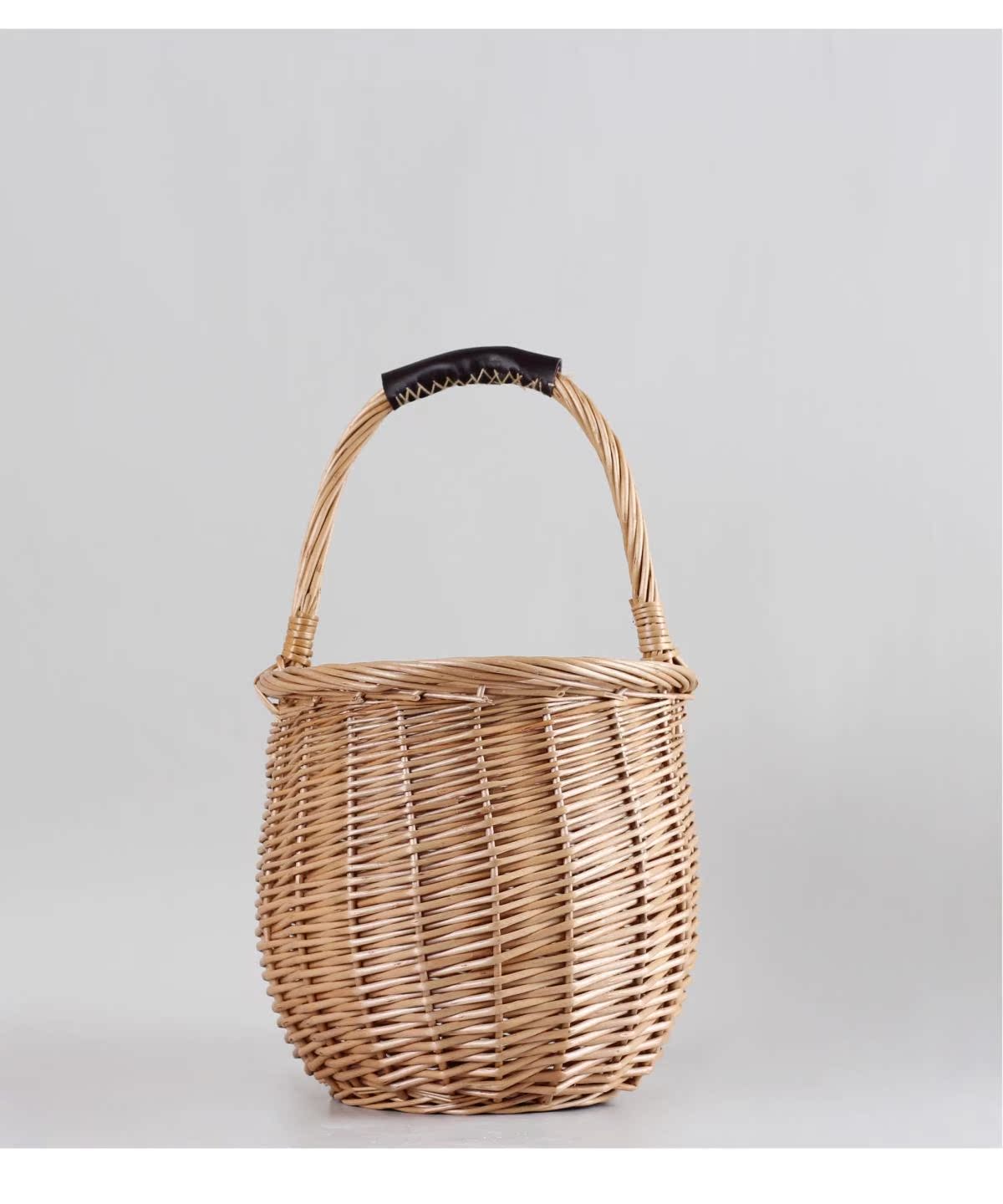 カゴバッグ 手編み籐素材の丸型ハンドバッグ