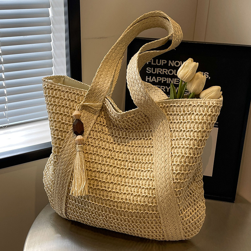 タッセル付き編み込みカゴバッグトート