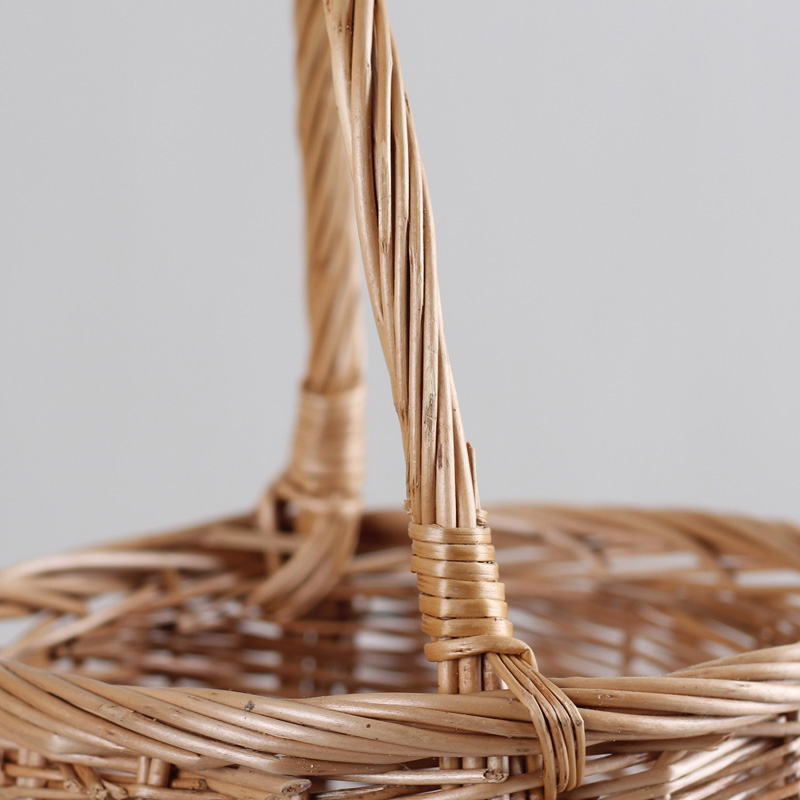 カゴバッグ 手編み籐素材の丸型ハンドバッグ