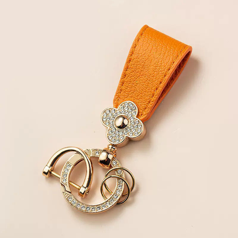 キーリング 花モチーフとラインストーン装飾のレザーキーリング