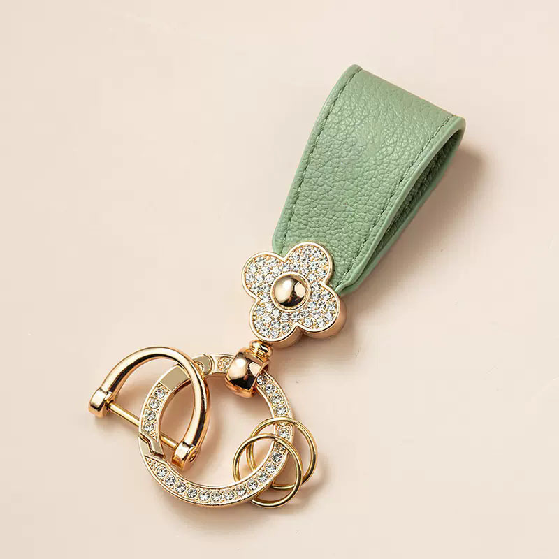 キーリング 花モチーフとラインストーン装飾のレザーキーリング