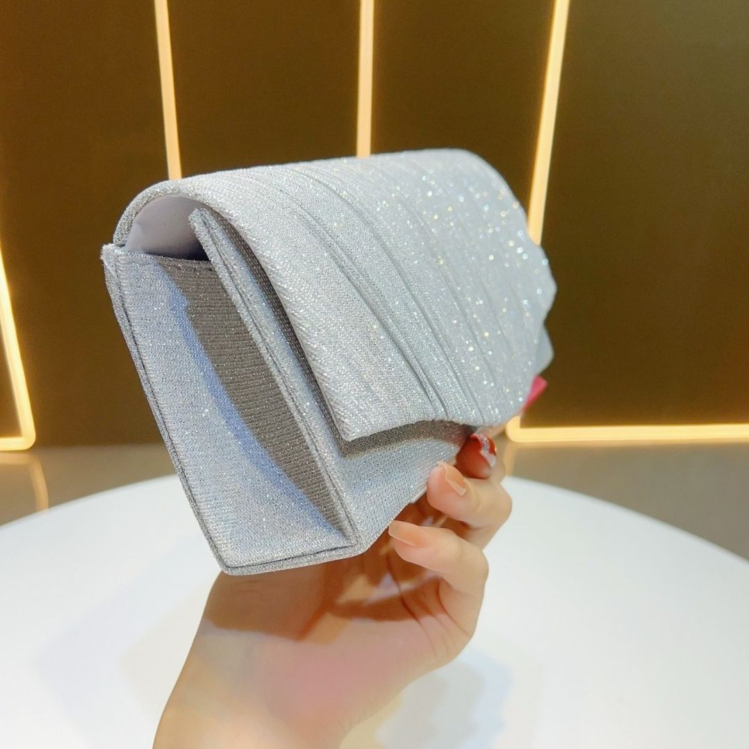 着物バッグ 煌めく波紋仕立ての上品な着物生地クラッチ