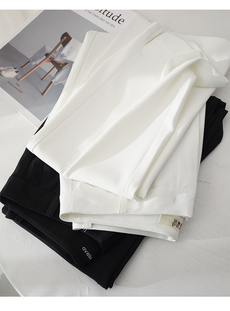 黒パンツ 上品フレアシルエットパンツ
