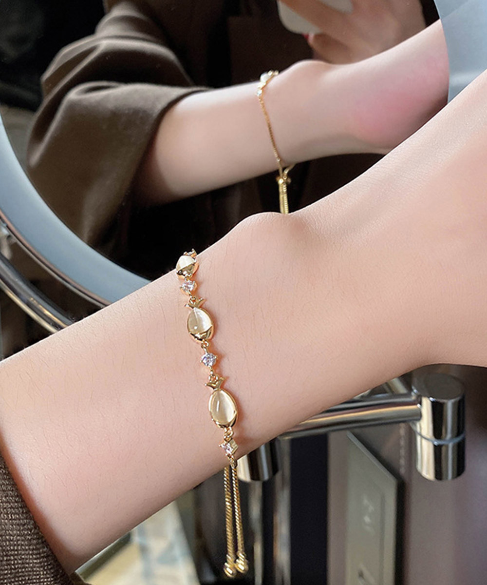 ブレスレットレディース ゴールド小魚モチーフブレスレット華奢バングル