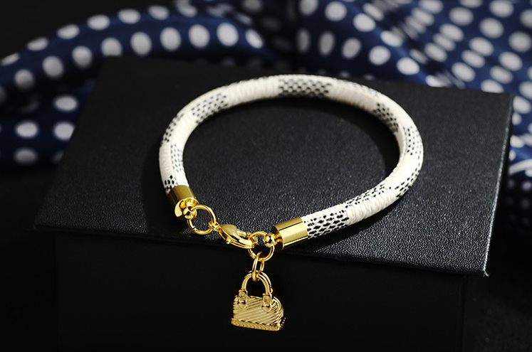 ブレスレットレディース 女性用ゴールド鞄型飾り付きブレスレット高級感腕輪