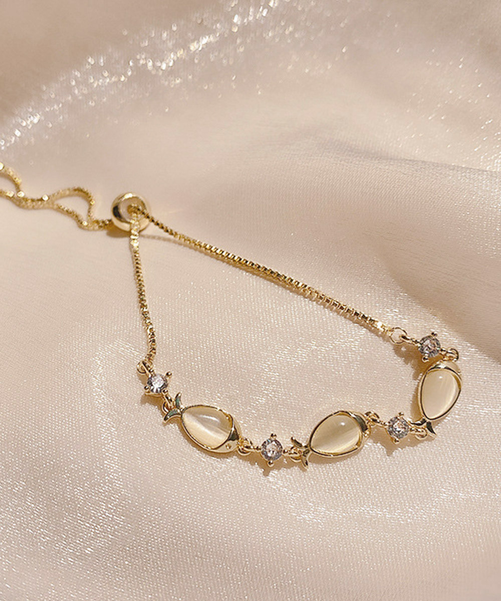 ブレスレットレディース ゴールド小魚モチーフブレスレット華奢バングル