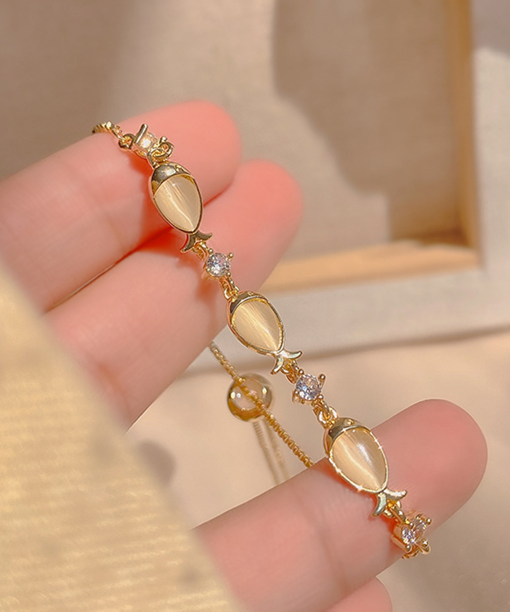 ブレスレットレディース ゴールド小魚モチーフブレスレット華奢バングル