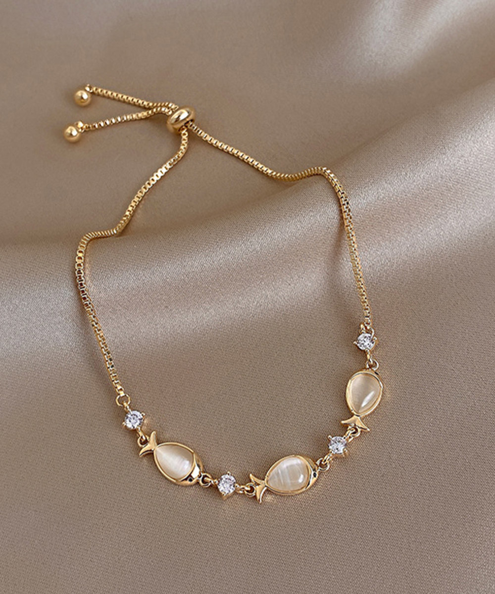 ブレスレットレディース ゴールド小魚モチーフブレスレット華奢バングル