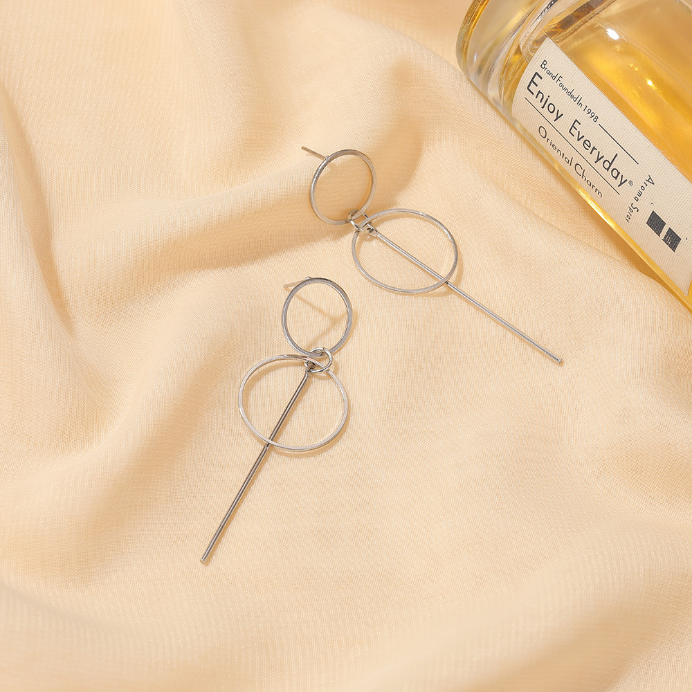 レディースピアス 二重円環と直線棒の幾何学的ロングピアス