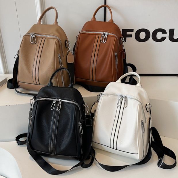 縦ライン装飾付き二層式　通学PUレザーリュック