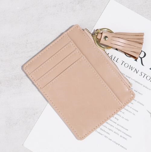 革 財布 革タッセル付きコインケース