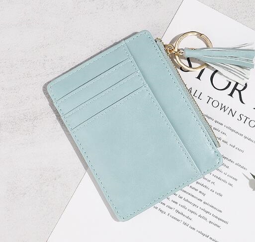 革 財布 革タッセル付きコインケース