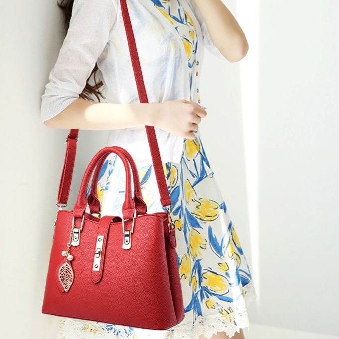 革バッグレディース 葉型チャーム付き上品な二重取っ手革バッグ