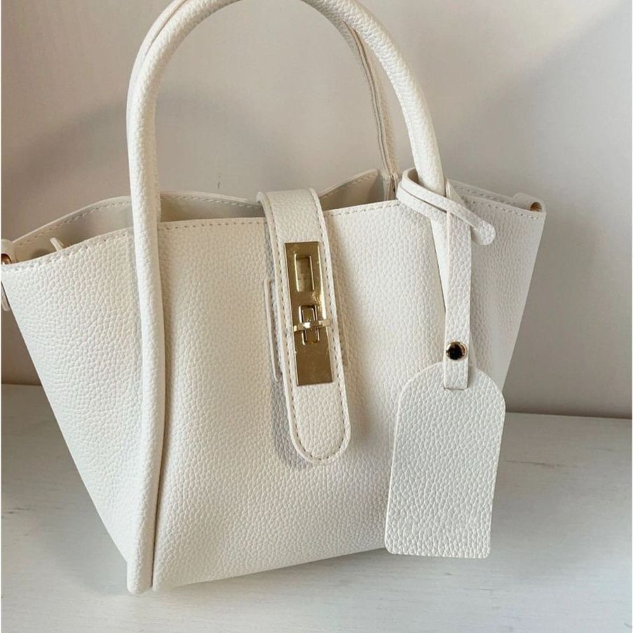 革バッグレディース 金具アクセント付き本革台形ハンドバッグ