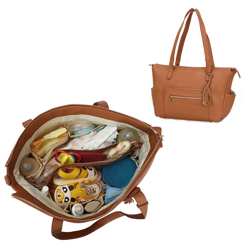 革バッグレディース 大容量多機能房飾り付きママバッグ
