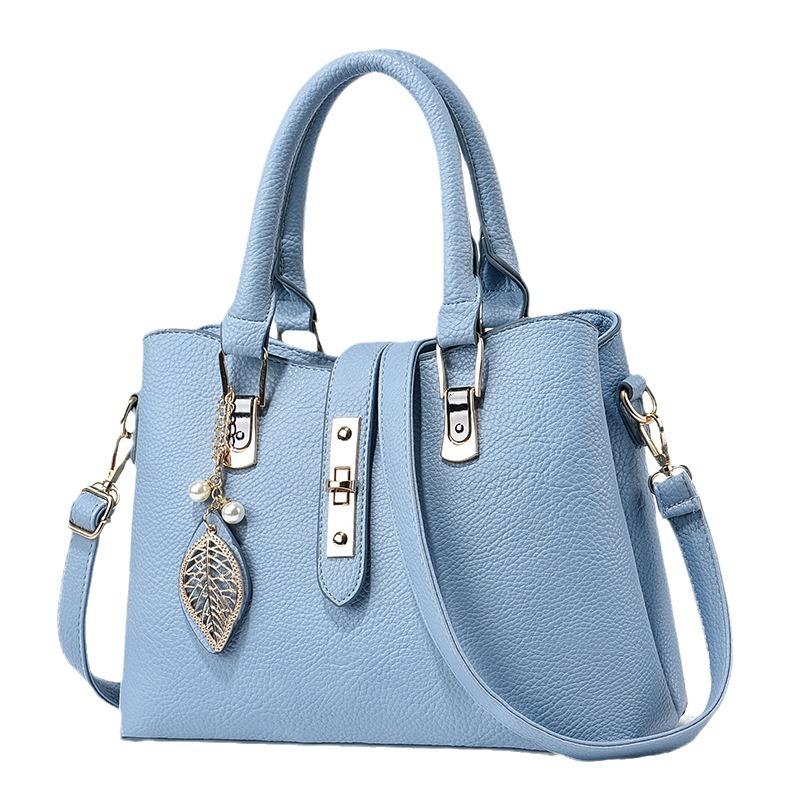 革バッグレディース 葉型チャーム付き上品な二重取っ手革バッグ
