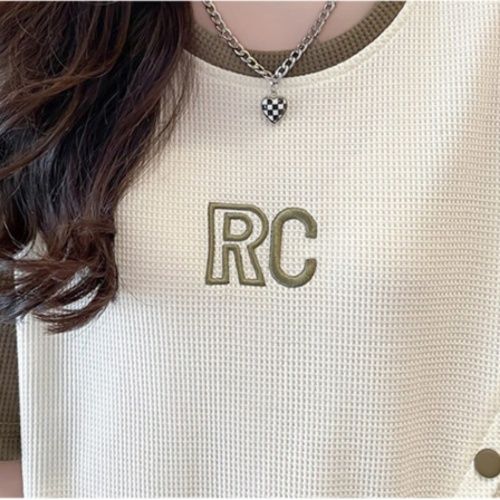 オーバーサイズTシャツ レディースレイヤード風ボタンデザインリブ編み半袖ゆったりトップス