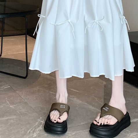 女装 リボン結びティアード裾広がりロングスカート