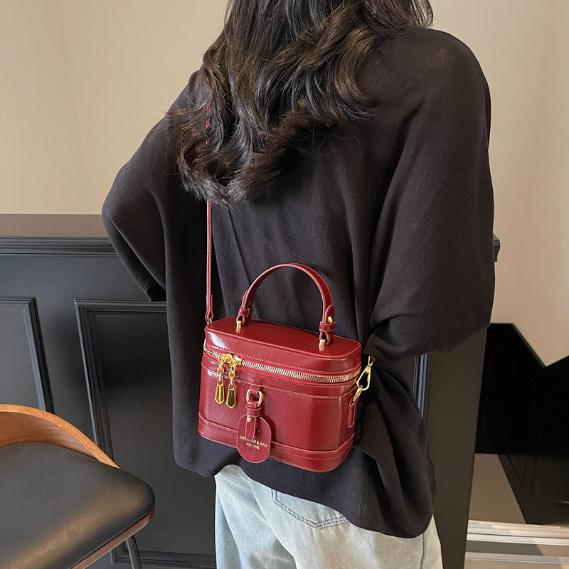 ミニバッグ バニティ型艶感合成皮革二重ファスナーミニバッグ