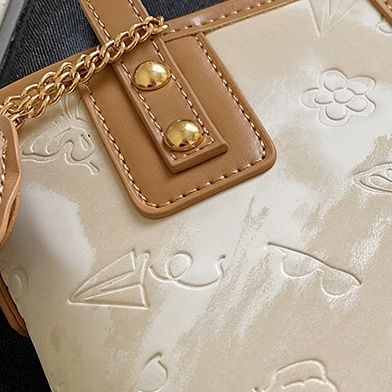 ミニバッグ 花柄型押し二wayキュートチャーム付きミニバッグ