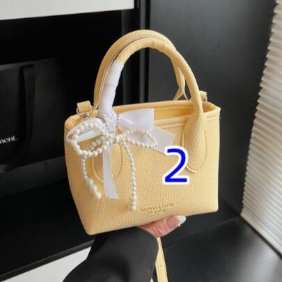 ミニバッグ パール装飾リボン付きレディースミニハンドバッグ