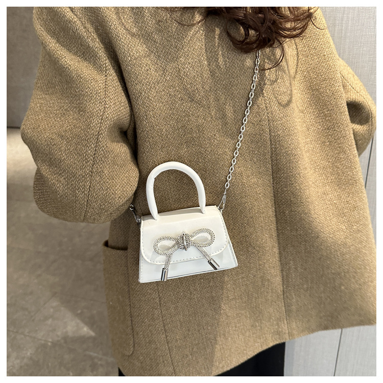 ミニバッグ きらめくリボンミニハンドバッグ