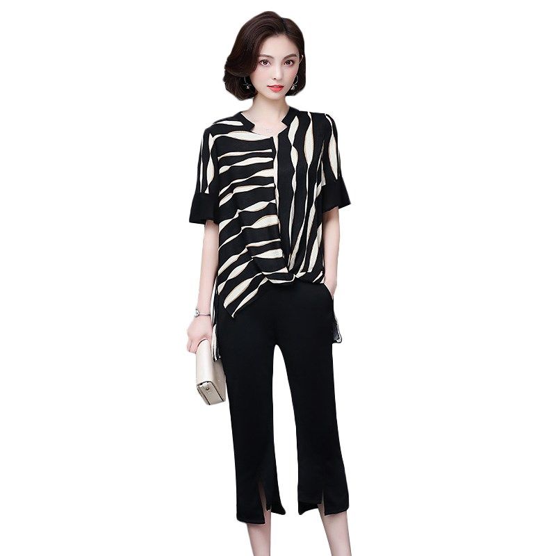 パーティードレス アシンメトリー柄トップスとスリットパンツのセットアップ