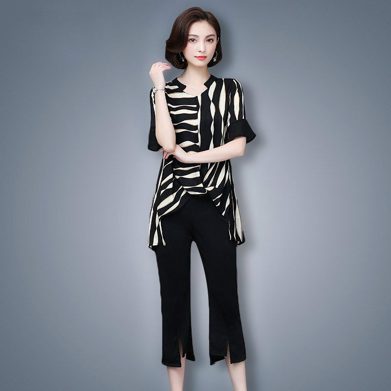 パーティードレス アシンメトリー柄トップスとスリットパンツのセットアップ