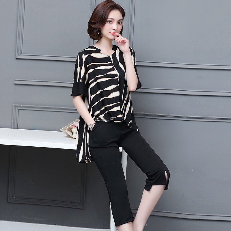 パーティードレス アシンメトリー柄トップスとスリットパンツのセットアップ