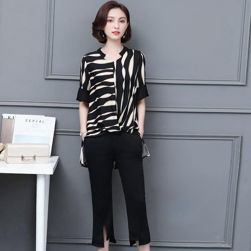 パーティードレス アシンメトリー柄トップスとスリットパンツのセットアップ