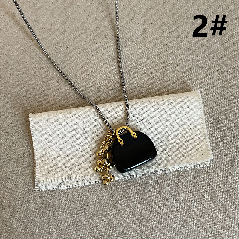 レゴールドチェーン付きミニバッグモチーフ首飾りレディース