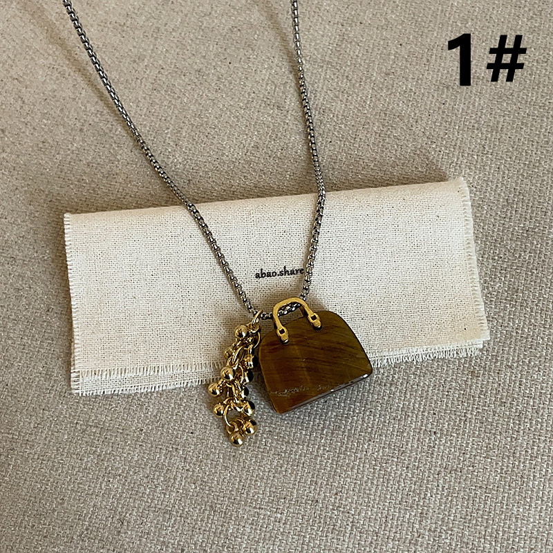 レゴールドチェーン付きミニバッグモチーフ首飾りレディース