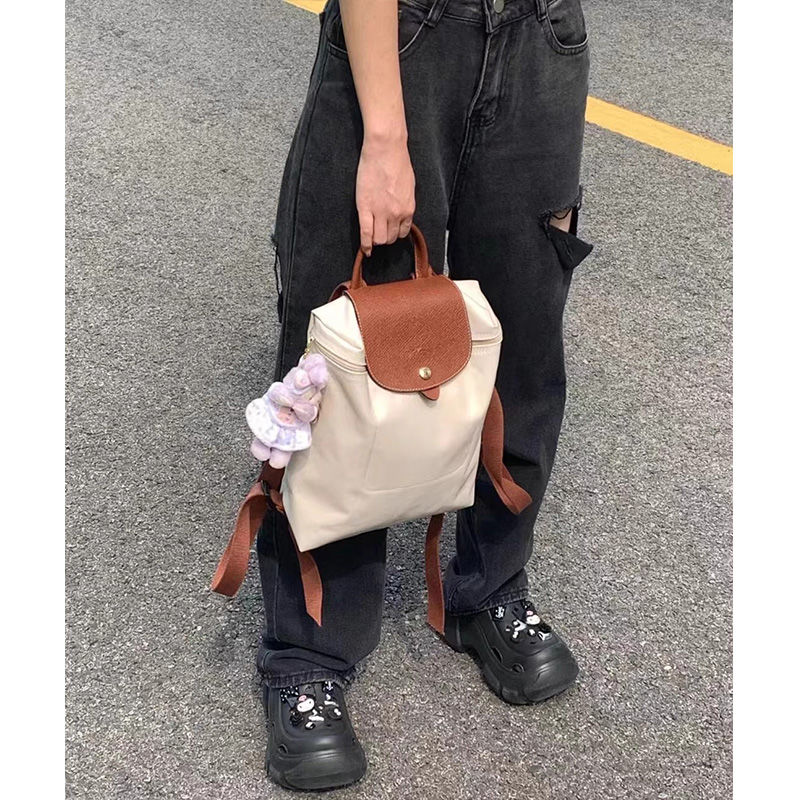 30代ファッション 洗練フラップリュック