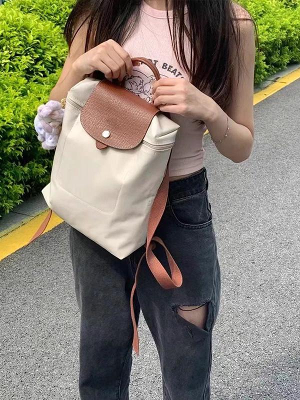 30代ファッション 洗練フラップリュック