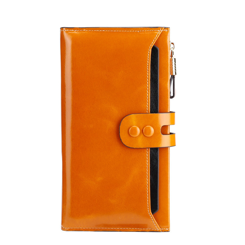 三つ折り本革エナメル仕上げボタン留め長財布