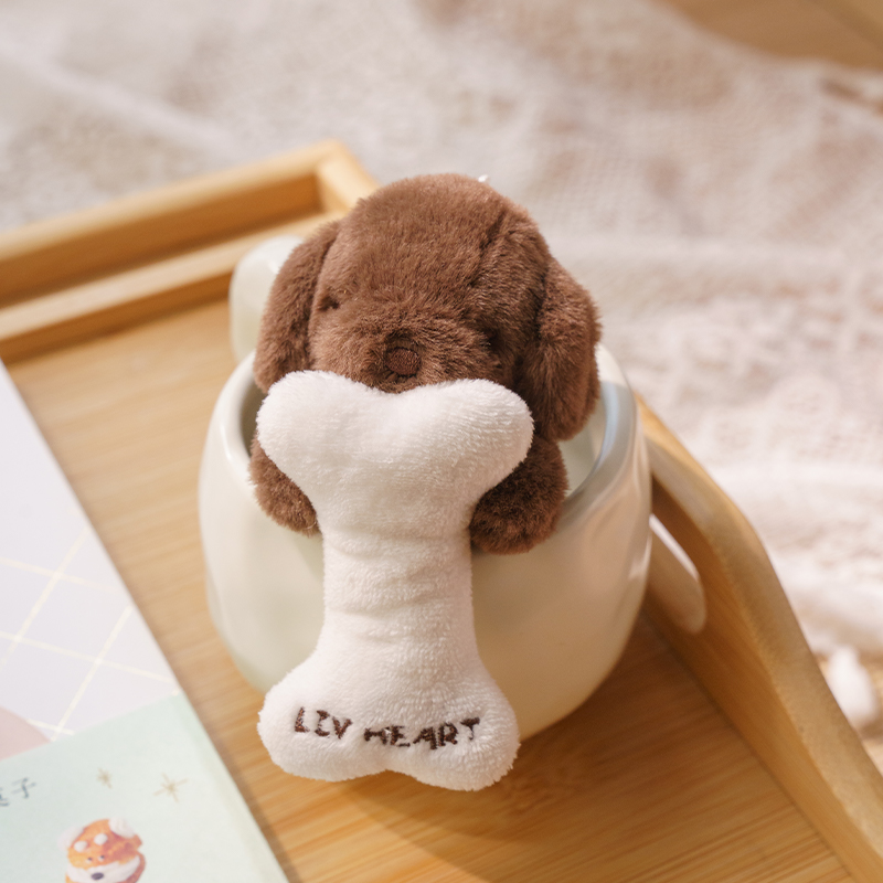 犬 ぬいぐるみ おねだりプードル 骨抱きキーホルダー