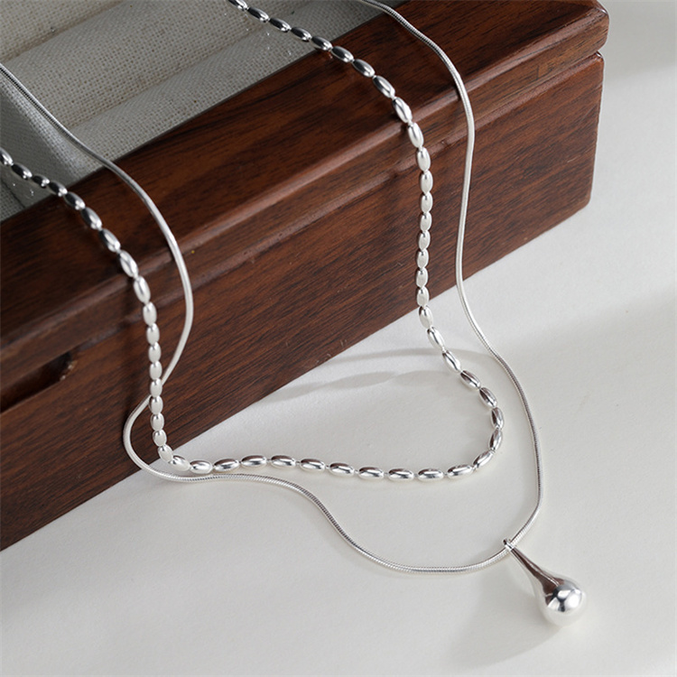 https://fulmo-img-server.com/necklacety/1e502b16-130b-43b4-a0e9-0ce520d9b1a2.jpg