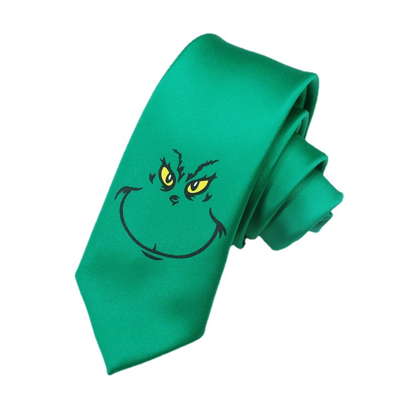 ネクタイ緑いたずらっぽい笑顔刺繍入り遊び心溢れる