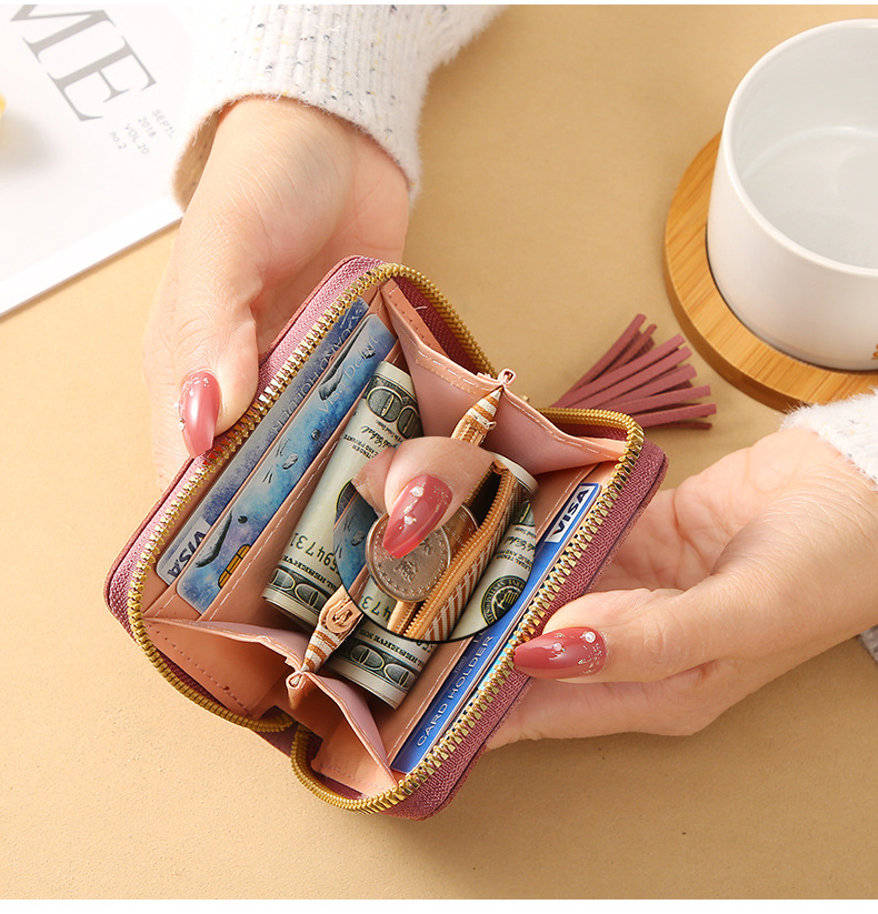 二つ折り財布 ハートモチーフ タッセル付き