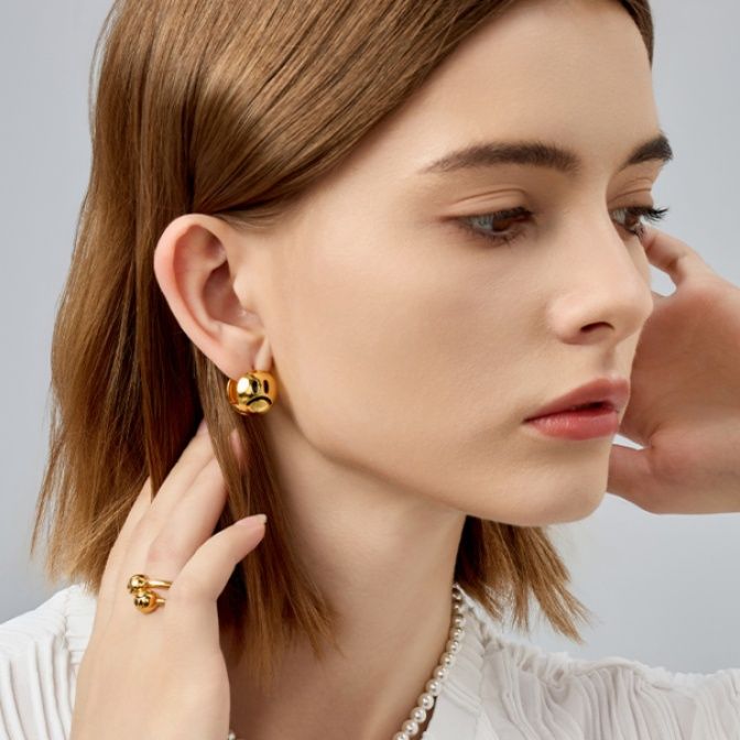 ペア アクセサリーピアス 喜怒表情ペアピアス