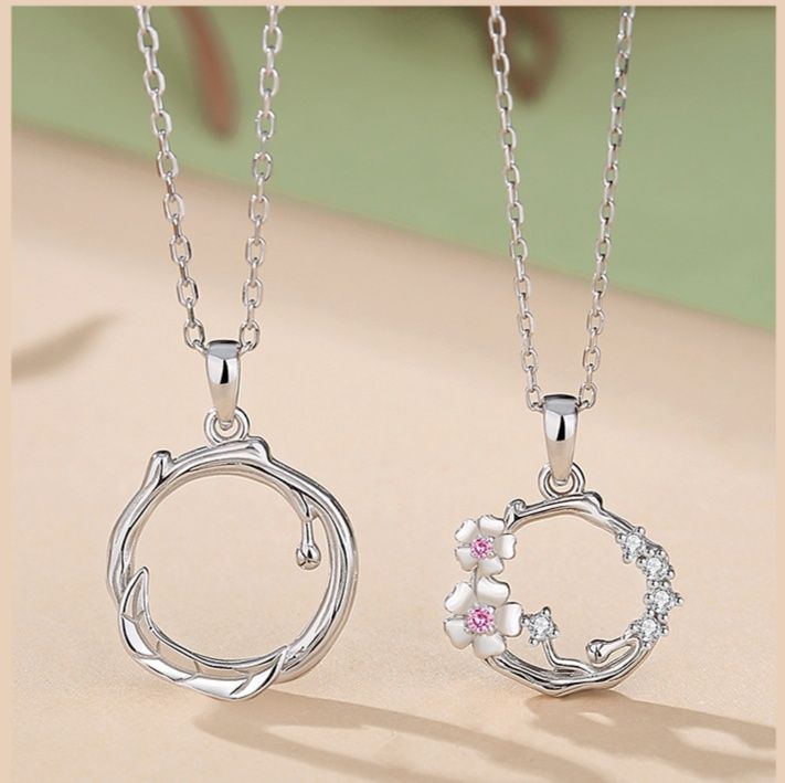 ペア アクセサリー 月と太陽モチーフ サークル ネックレス