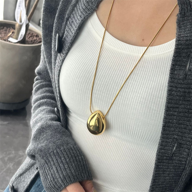 ペア アクセサリー 楕円形ペアネックレス 錆びにくい高級感首飾り