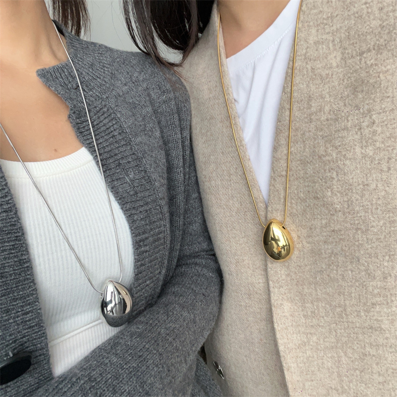 ペア アクセサリー 楕円形ペアネックレス 錆びにくい高級感首飾り